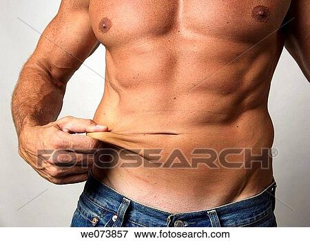 Tough strong man in his 30s showing excess skin View Large Photo Image Stock Photo - Tough strong man in his 30s showing excess skin. Fotosearch