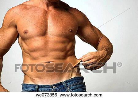 Tough strong man in his 30s showing excess skin View Large Photo Image Stock Photograph - Tough strong man in his 30s showing excess skin. Fotosearch