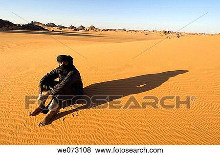 Tuareg, Akakus, Sahara desert, Fezzan, Libya View Large Photo Image Stock Photo - Tuareg, Akakus, Sahara desert, Fezzan, Libya. Fotosearch