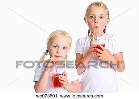 Two blond girls drinking lemonade with a straw View Large Photo Image Stock Image - Two blond girls drinking lemonade with a straw. Fotosearch
