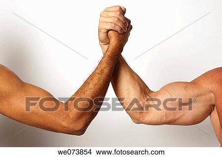 Two men: one super strong one normal arm wrestling View Large Photo Image Picture - Two men: one super strong one normal arm wrestling. Fotosearch
