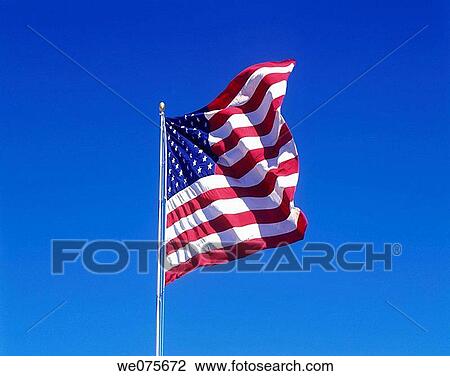 UNITED STATES FLAG. WITH BLUE SKY View Large Photo Image Stock Image - UNITED STATES FLAG. WITH BLUE SKY. Fotosearch