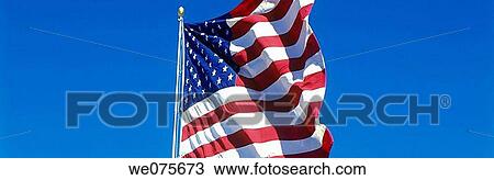 UNITED STATES FLAG. WITH BLUE SKY View Large Photo Image Stock Image - UNITED STATES FLAG. WITH BLUE SKY. Fotosearch