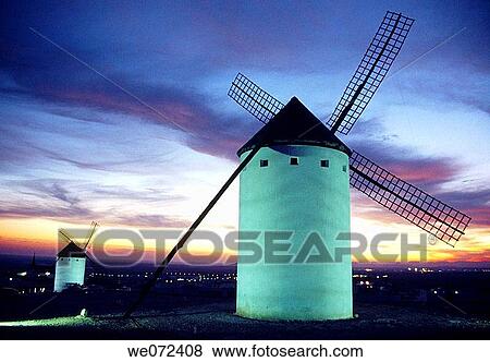 Windmills at dusk, Campo de Criptana. Ciudad Real province, Castilla-La Mancha, Spain View Large Photo Image Stock Photo - Windmills at dusk, Campo de Criptana. Ciudad Real province, Castilla-La Mancha, Spain. Fotosearch