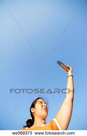 Woman holding Bible View Large Photo Image Stock Image - Woman holding Bible. Fotosearch
