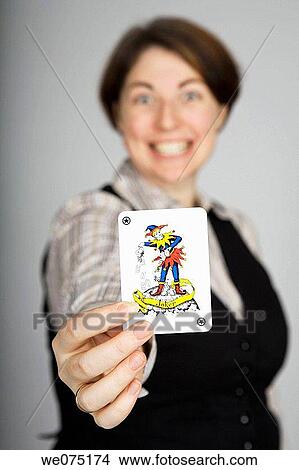 Picture - woman with joker. Fotosearch
