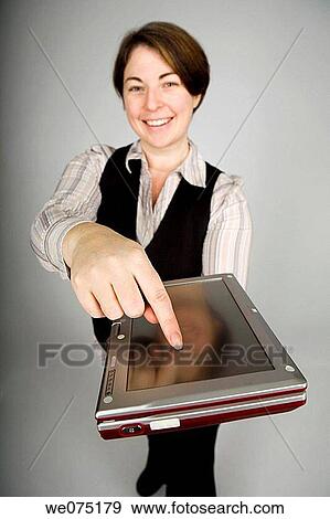 Stock Photo - woman with notebook computer. Fotosearch