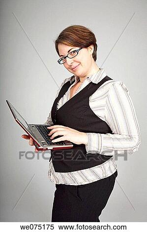 woman with notebook computer View Large Photo Image Stock Photography - woman with notebook computer. Fotosearch
