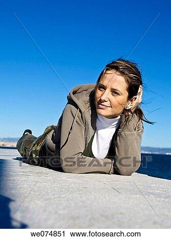Young woman at port. Valencia, Comunidad Valenciana, Spain View Large Photo Image Stock Image - Young woman at port. Valencia, Comunidad Valenciana, Spain. Fotosearch