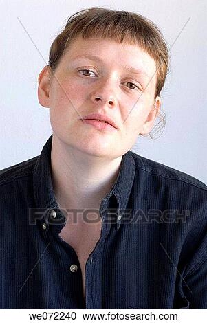 Young woman in black shirt View Large Photo Image Stock Image - Young woman in black shirt. Fotosearch