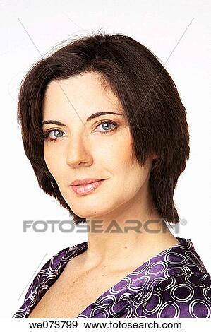 Young woman in her 30s posing View Large Photo Image Stock Photo - Young woman in her 30s posing. Fotosearch