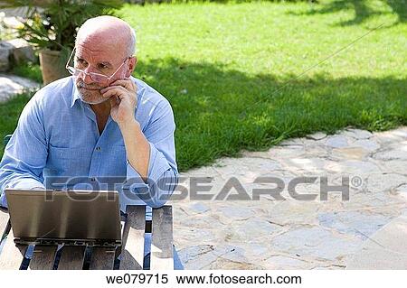 Stock Photography - absent-mindedness, at-home, absorbed, Absent-minded. Fotosearch