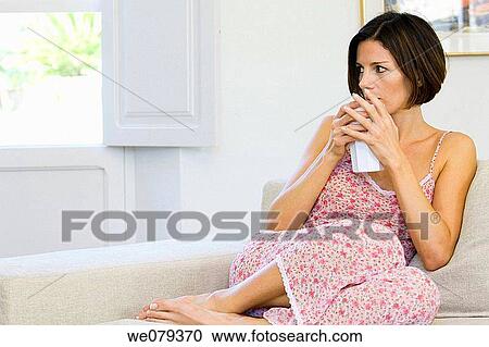 absent-mindedness, brunette, barefoot, at-home, Absent-minded View Large Photo Image Stock Image - absent-mindedness, brunette, barefoot, at-home, Absent-minded. Fotosearch
