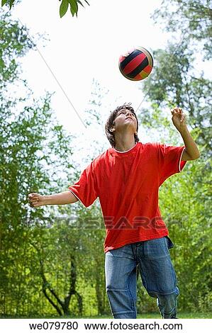 Stock Image - action, boy, ball, ability. Fotosearch