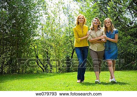 Stock Image - adolescence, blond, 3 generations. Fotosearch