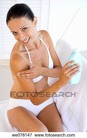Stock Photo - after-sun, beauty, apply, after. Fotosearch