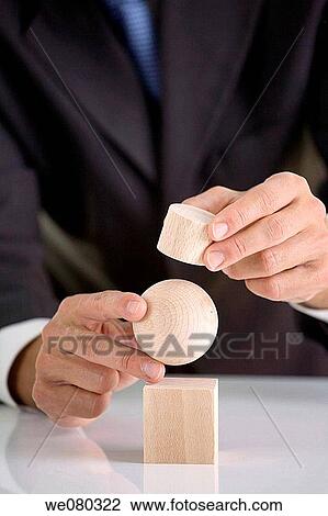 Stock Image - allegory, businessman, business, balance, ability. Fotosearch