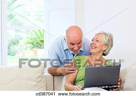 Stock Image - amusement, bonding, bond, at-home, affection. Fotosearch