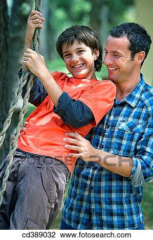 amusement, boy, black hair, aid View Large Photo Image Stock Image - amusement, boy, black hair, aid. Fotosearch