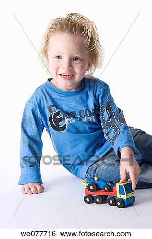 amusement, boy, blue eyes, blond, 3-4 years View Large Photo Image Stock Photograph - amusement, boy, blue eyes, blond, 3-4 years. Fotosearch