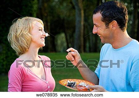 amusement, cake, bonding, bond, affection View Large Photo Image Stock Photography - amusement, cake, bonding, bond, affection. Fotosearch