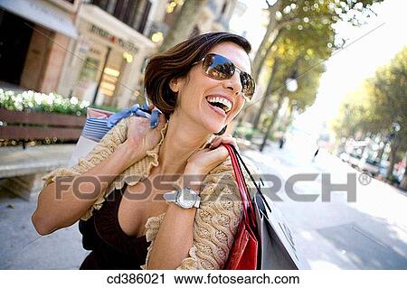 amusement, carry, brunette, bag, addiction View Large Photo Image Stock Image - amusement, carry, brunette, bag, addiction. Fotosearch