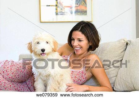animal, brunette, at-home, amusement View Large Photo Image Stock Photo - animal, brunette, at-home, amusement. Fotosearch