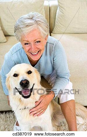 Stock Photo - animal, caressing, caress, at-home, affection. Fotosearch
