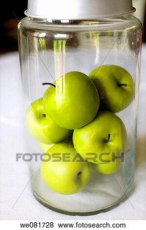 Apples in a glass jar View Large Photo Image Stock Photo - Apples in a glass jar. Fotosearch