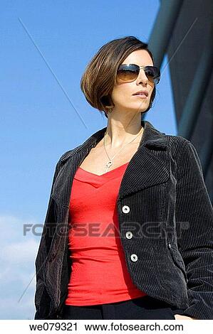 Stock Image - arrogant, brunette, arrogance. Fotosearch