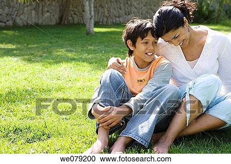 Stock Image - Asian, bonding, bond, barefoot, affection. Fotosearch