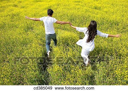 Asian, carefree, back view, Arms open View Large Photo Image Stock Photo - Asian, carefree, back view, Arms open. Fotosearch