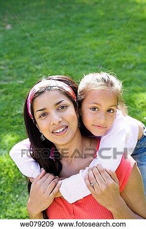Stock Photo - Asian, child, bonding, bond, affection. Fotosearch