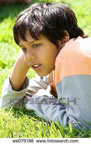 Asian, childhood, child, boy, absorbed View Large Photo Image Stock Photo - Asian, childhood, child, boy, absorbed. Fotosearch