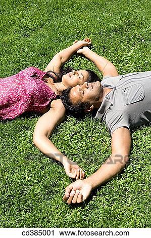 Asian, chilling out, calm, Arms open View Large Photo Image Stock Image - Asian, chilling out, calm, Arms open. Fotosearch