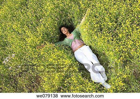 Asian, chilling out, calm, Arms open View Large Photo Image Stock Photo - Asian, chilling out, calm, Arms open. Fotosearch