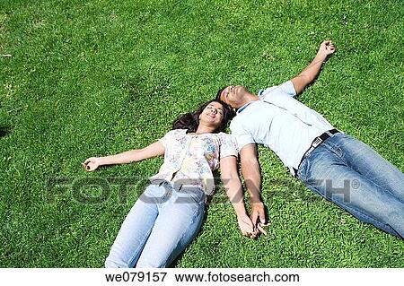 Asian, chilling out, calm, Arms open View Large Photo Image Stock Photo - Asian, chilling out, calm, Arms open. Fotosearch