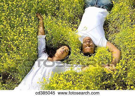 Stock Photography - Asian, chilling out, calm, Arms open. Fotosearch