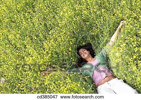 Asian, chilling out, carefree, calm, Arms open View Large Photo Image Stock Photo - Asian, chilling out, carefree, calm, Arms open. Fotosearch