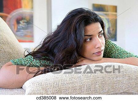 Asian, contemporary, at-home, absorbed View Large Photo Image Stock Photo - Asian, contemporary, at-home, absorbed. Fotosearch