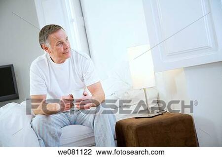 at-home, bedroom, bed, absorbed View Large Photo Image Stock Image - at-home, bedroom, bed, absorbed. Fotosearch