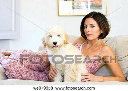at-home, brunette, barefoot, animal View Large Photo Image Stock Photo - at-home, brunette, barefoot, animal. Fotosearch
