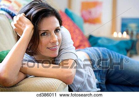 Stock Image - at-home, calm, absorbed. Fotosearch