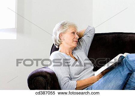 at-home, calm, book, absorbed View Large Photo Image Stock Photography - at-home, calm, book, absorbed. Fotosearch