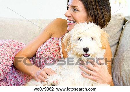 at-home, caressing, caress, brunette, animal View Large Photo Image Stock Image - at-home, caressing, caress, brunette, animal. Fotosearch