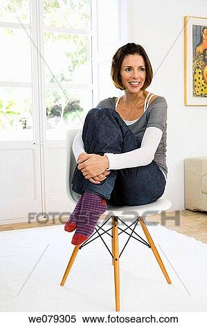 at-home, chair, absorbed View Large Photo Image Stock Photography - at-home, chair, absorbed. Fotosearch