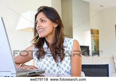 Stock Photo - at-home, contemporary, computer, Asian. Fotosearch