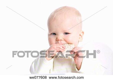 Stock Photo - baby, bite, biting, blond, blue eyes. Fotosearch