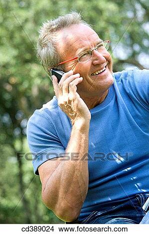 baby boomer, calling, cell phone View Large Photo Image Picture - baby boomer, calling, cell phone. Fotosearch