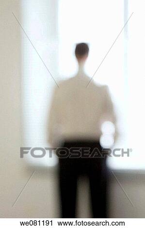 Stock Image - back view, backlight, business, businessman. Fotosearch